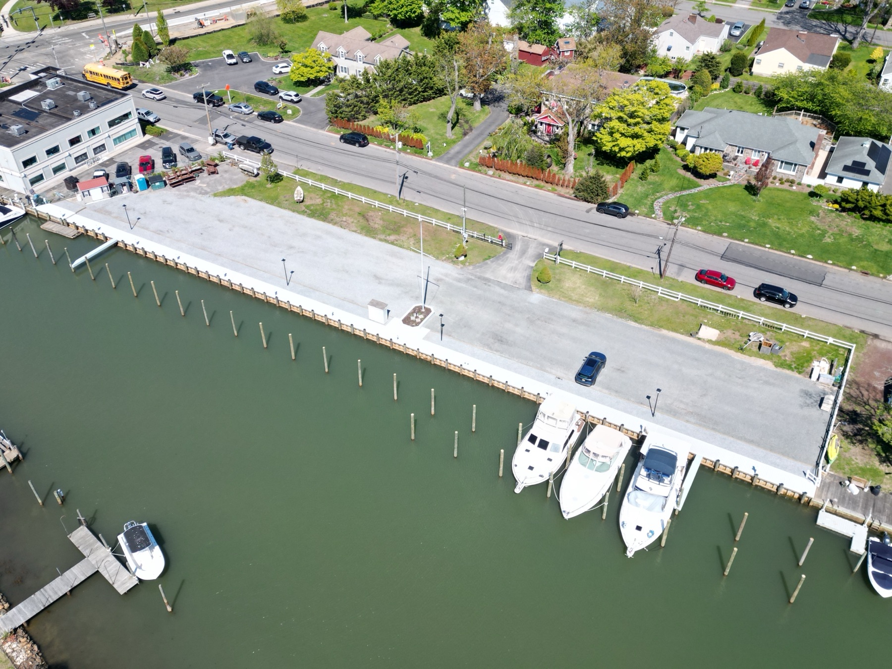 Boats docked in slips at Pearce Boat Works marina on the Great South Bay in Amityville, NY